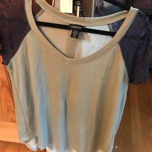 Light olive green top with dark gray lace sleeves